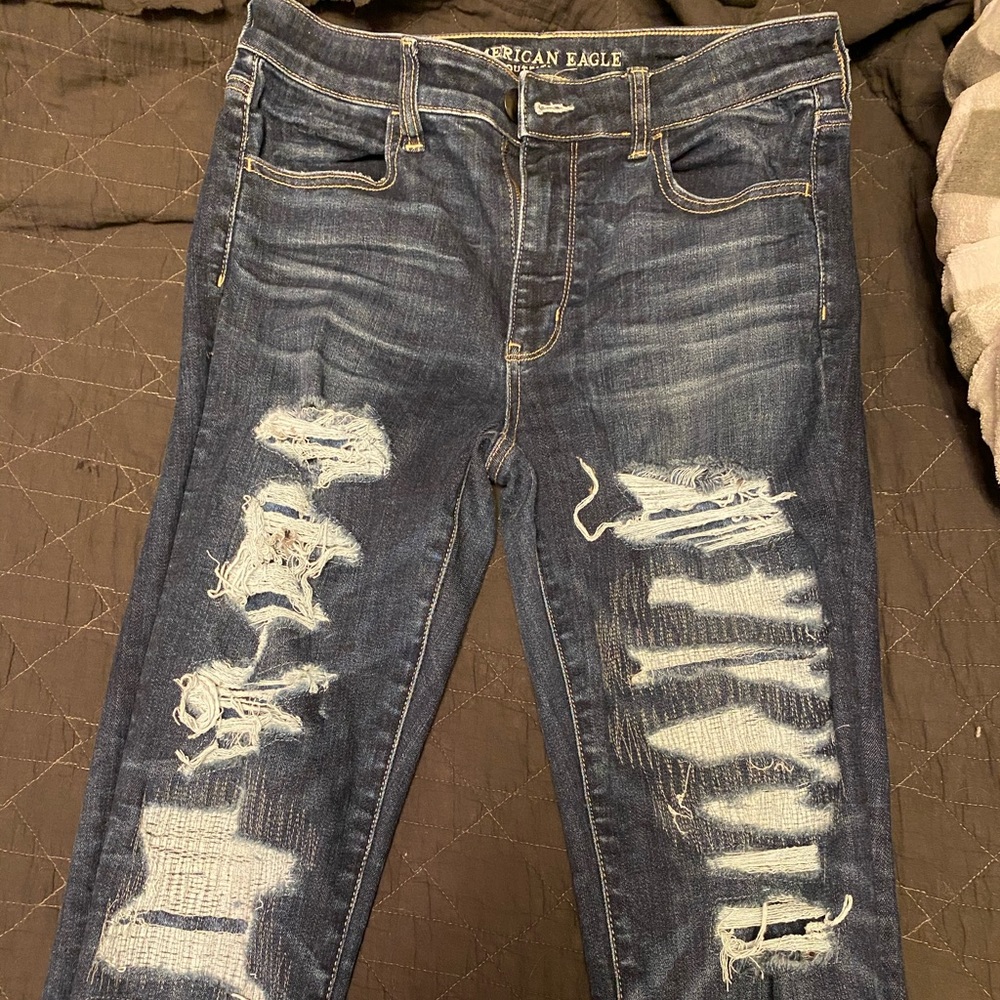 Dark wash, ripped American Eagle skinny jeggings